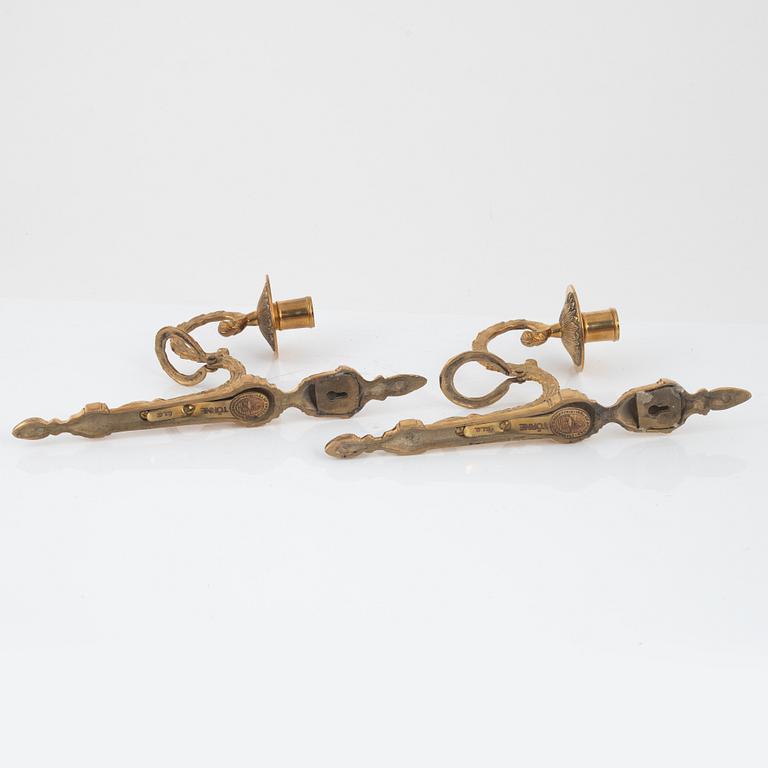 A pair of 'Törne' brass one-light wall ligths from IKEA's 18th Century collection.