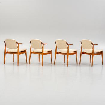Four teak armchairs, mid 20th century.