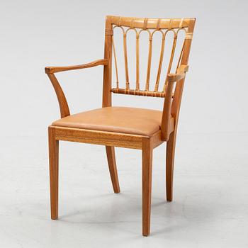 A model 1165 armchair by Josef Frank for Firma Svenskt Tenn.