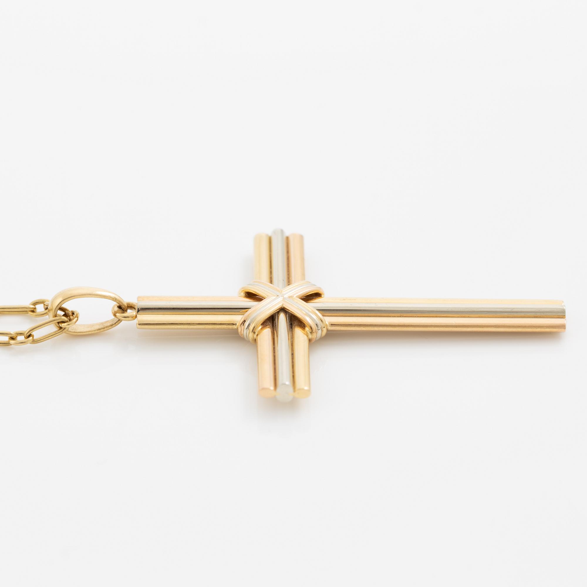 Cartier, A Cartier necklace 18K multi-coloured gold "Trinity" cross.