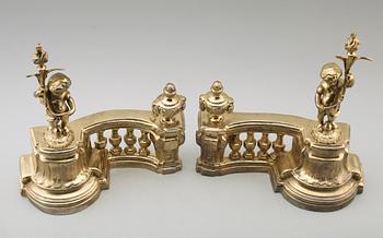 ELDHUNDAR, 1 par, förgylld metall, England, 1900-/2000-tal.