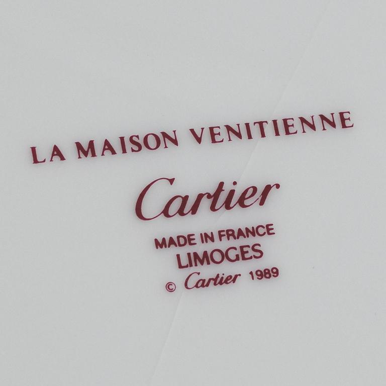 A set of 19 "La Maison Venitienne" porcelain service parts, Cartier, Limoges, France.