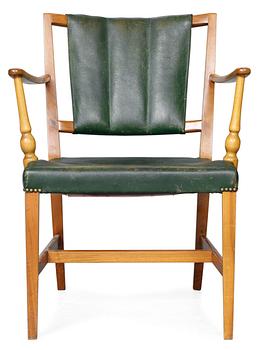 872. A Josef Frank mahogany and green leather easy chair, Firma Svenskt Tenn.
