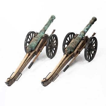 Modellkanoner ett par, 1900-tal.