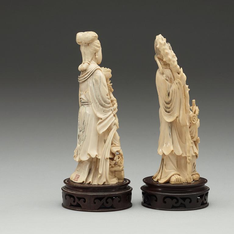 A pair of Chinese ivory figures, early 20th Century.