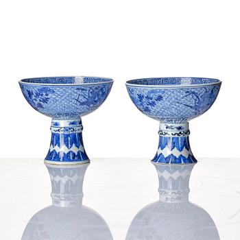 A pair of blue and white stemcups, Qing dynasty with Guangxu mark.