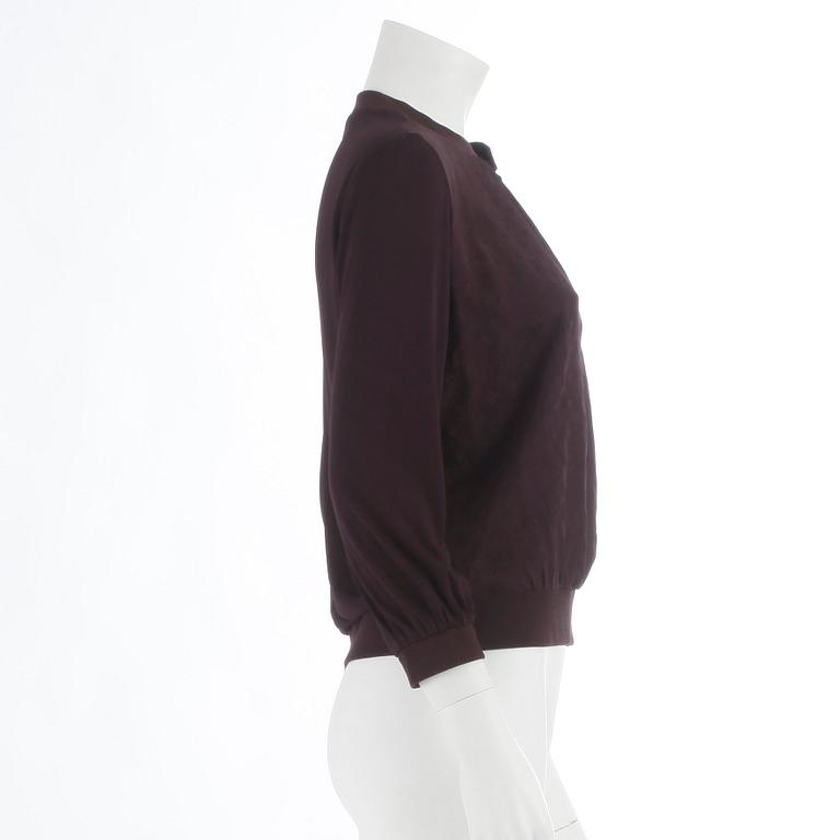 LOUIS VUITTON, a burgundy red monogrammed blouse, size 38.