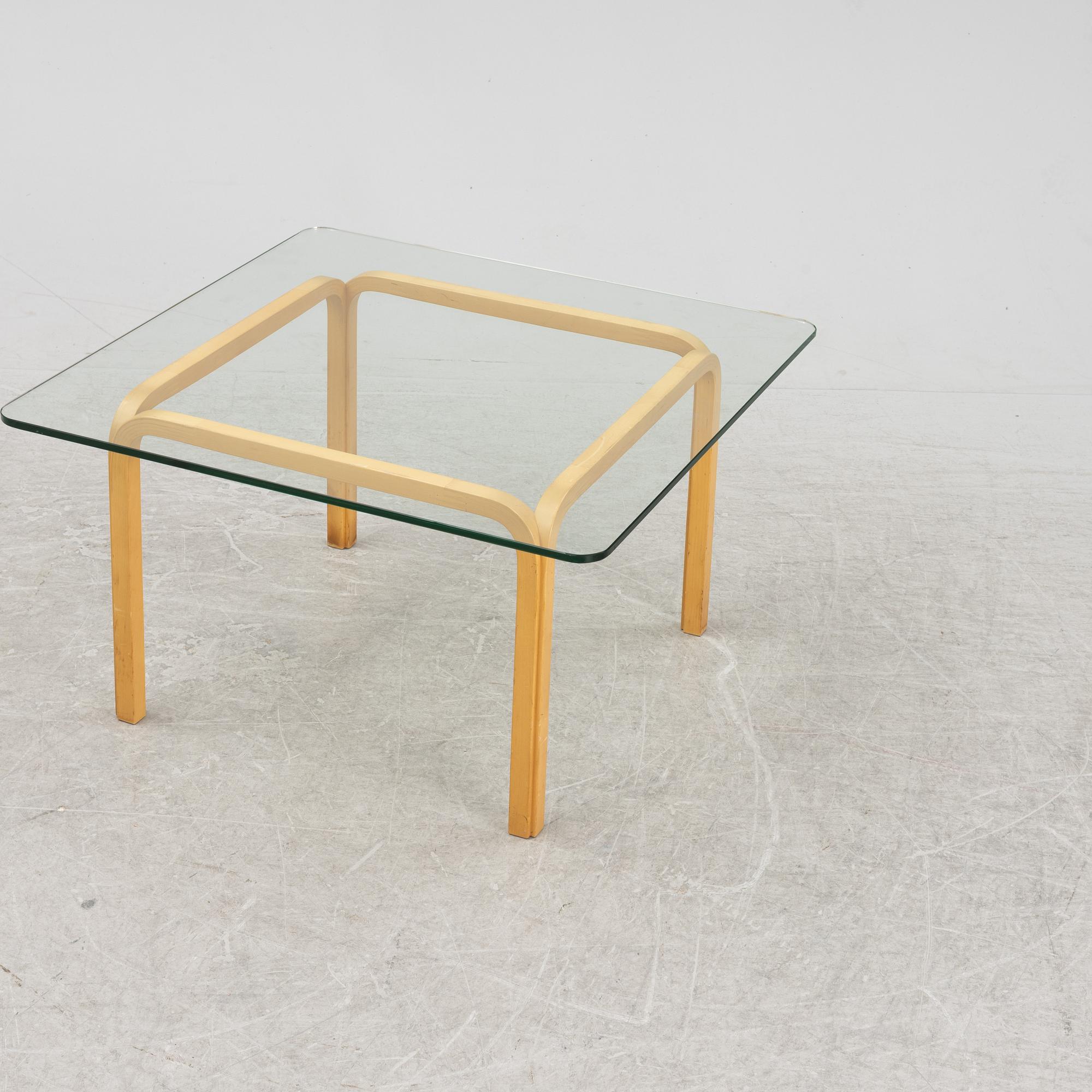 Alvar Aalto, a glass and birch model Y 805 coffee table, Artek, Finland.
