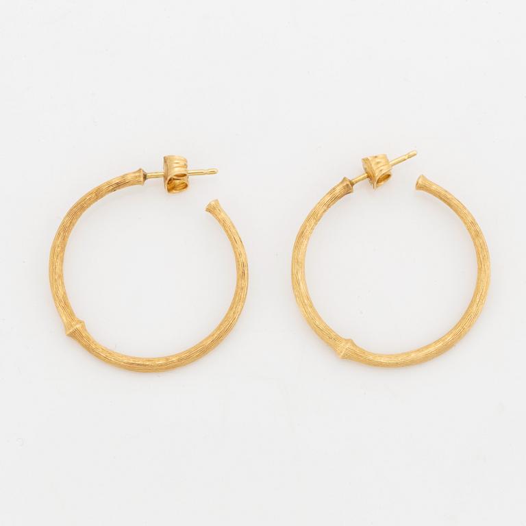 Ole Lynggaard, 18K gold earrings.