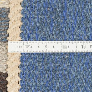 A Swedish flat weave rug, c. 304 x 197 cm.