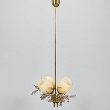 Paavo Tynell, A mid-20th-century '9029/4' chandelier for Taito, Finland.