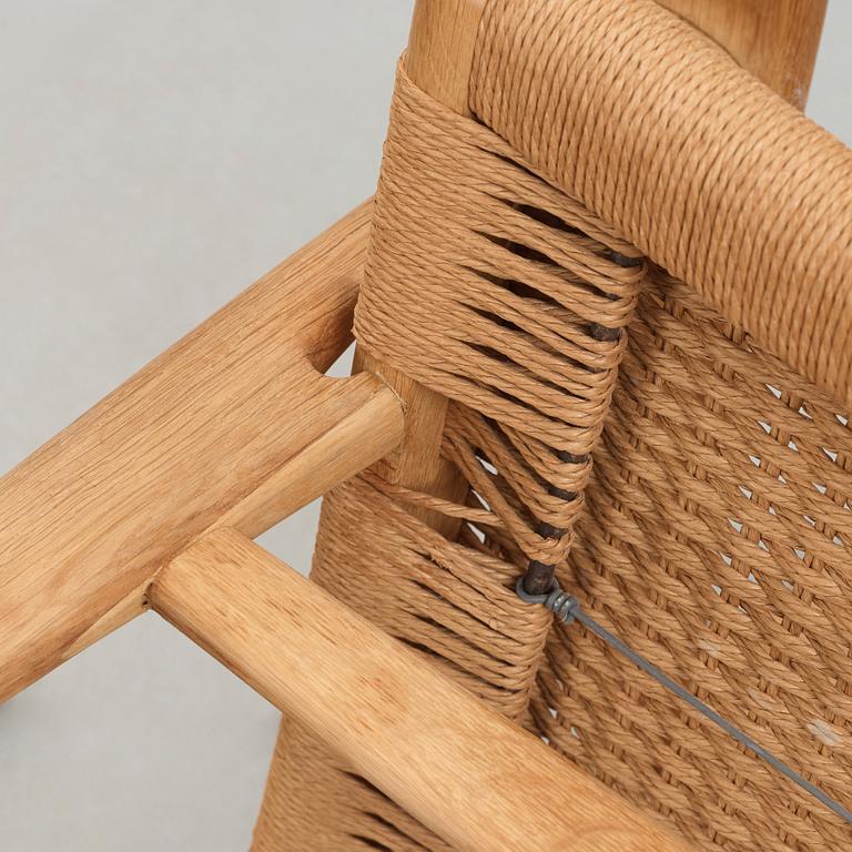 Hans J. Wegner, a pair of oak "CH-25" armchairs, Carl Hansen & Son, Denmark.