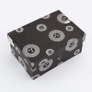 Piero Fornasetti, a pair of metal book stands.