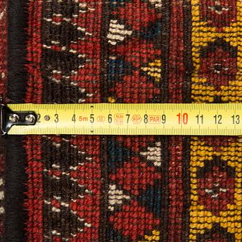 An Antique Beshir carpet, ca 183 x 390 cm.