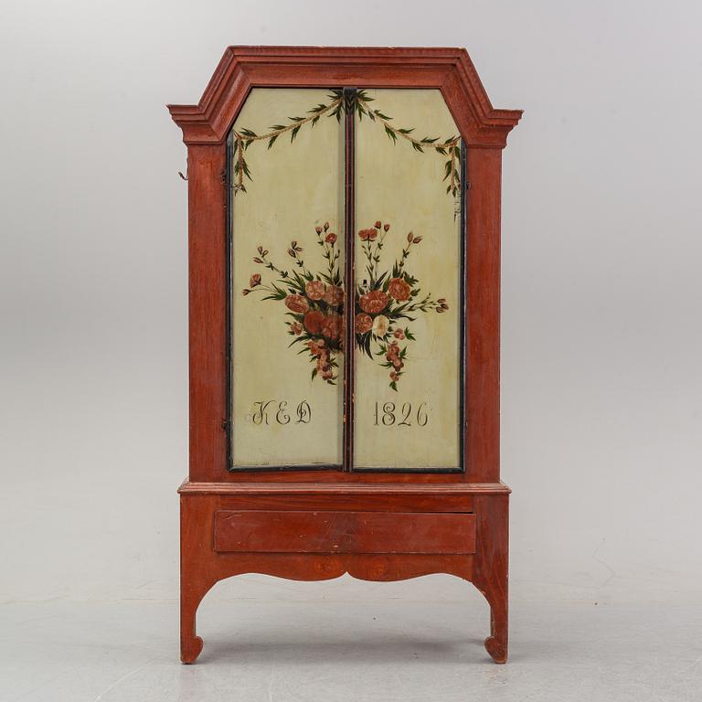 A painted cabinet from Jämtland, dated 1826.