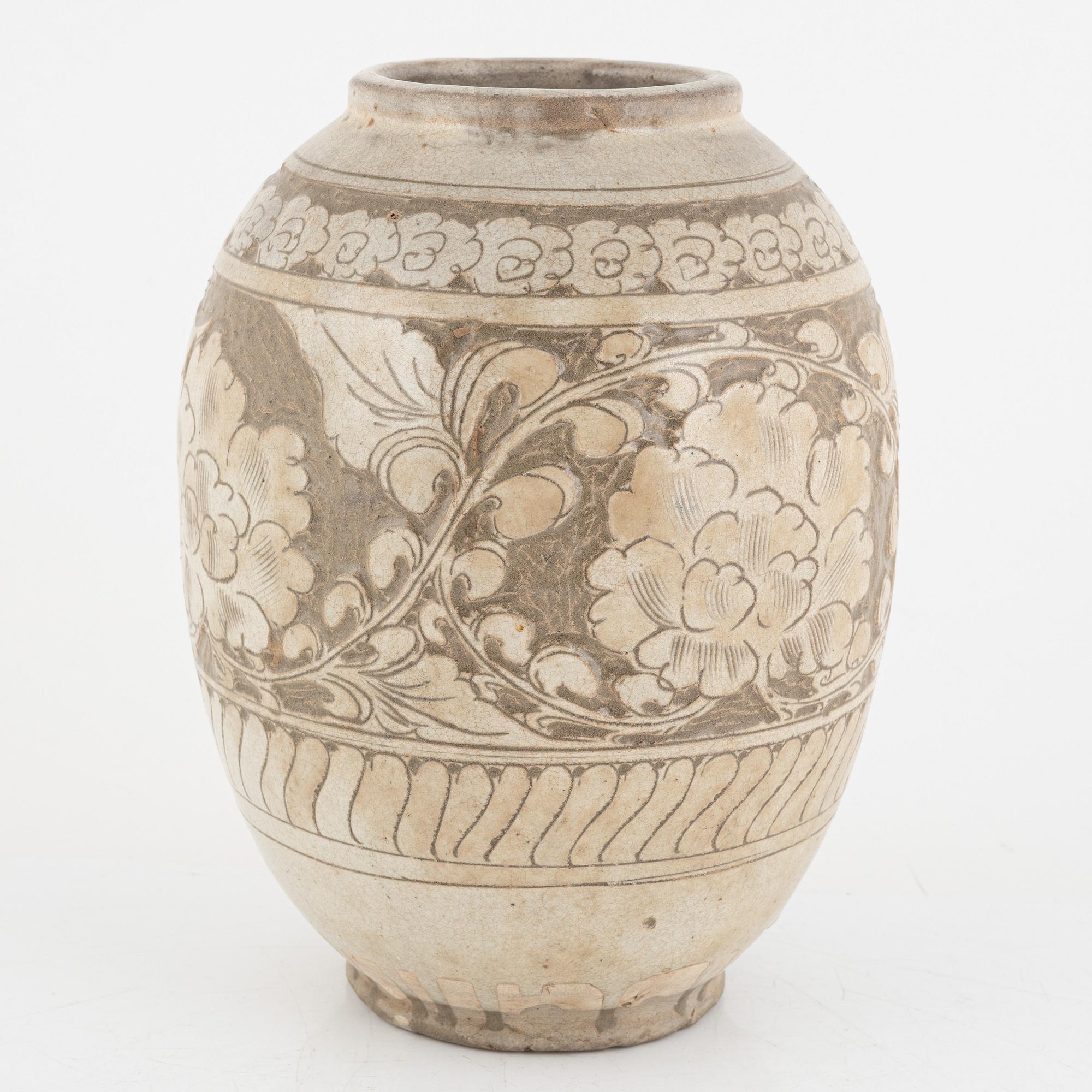 A Chinese glazed stoneware jar, probably Ming dynasty (1368–1644).