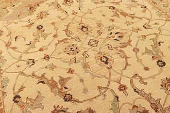 An oriental carpet with a Zeiglar pattern, c. 307 x 249 cm.