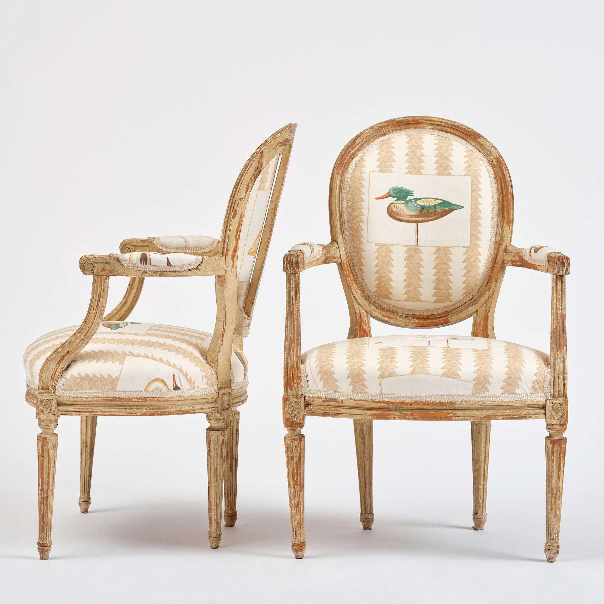 A pair of French Louis XVI children's open armchairs, late 18th century.