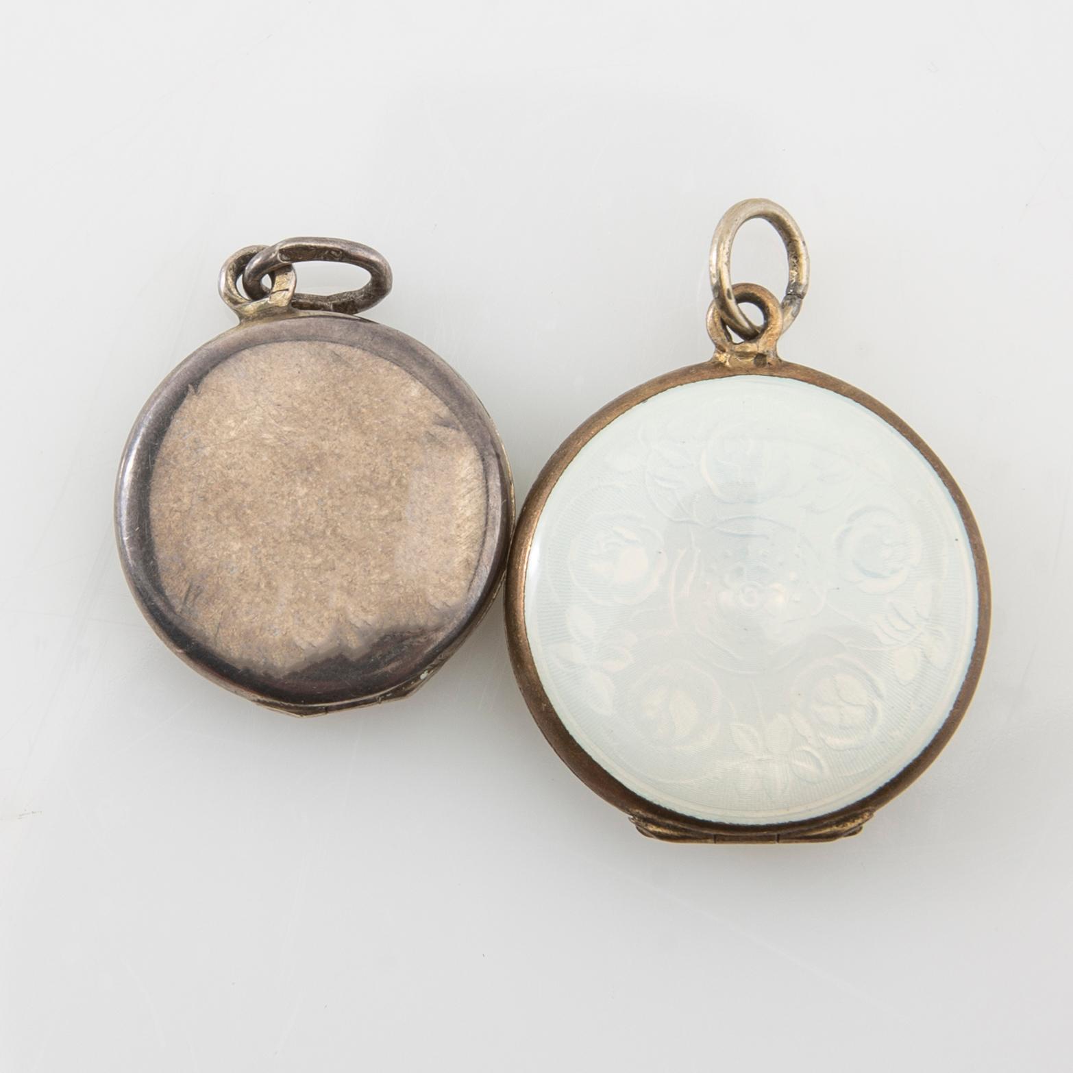 Two pendants and five brooches made of silver and enamel, including Aksel Holmsen, Norway, circa 1900.