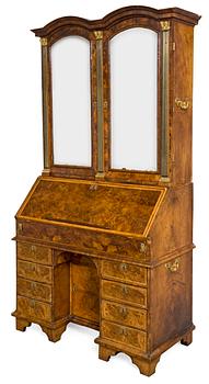 An English early 18th century walnut veneered and gilt bronze Bureau-Cabinet decorated with marquetry in première and contre partie on both sides of a cabinet door "LONDON THE XXV MAY ANNO 1716" under monogram SGB and Marquess's coronet.