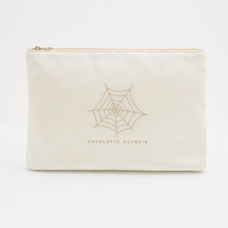 Charlotte Olympia, a pair of 'Cat nap' silk flats, a sleeping mask and a toilet bag, size S.