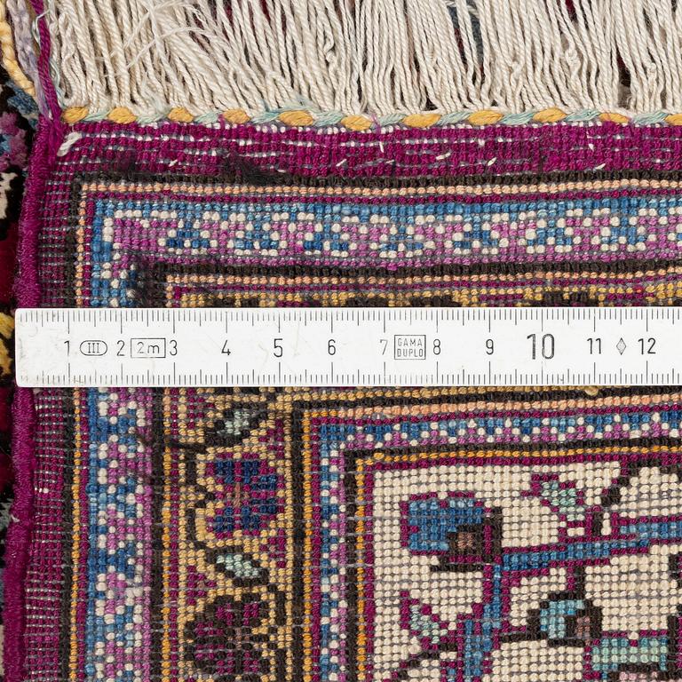 A semi-antique silk Keshan, 208 x 138 cm.
