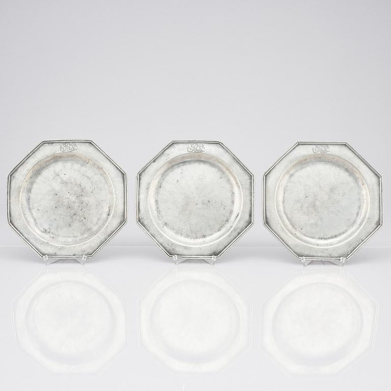 A set of six George II octagonal pewter plates by George Bacon of London mid 18th century.