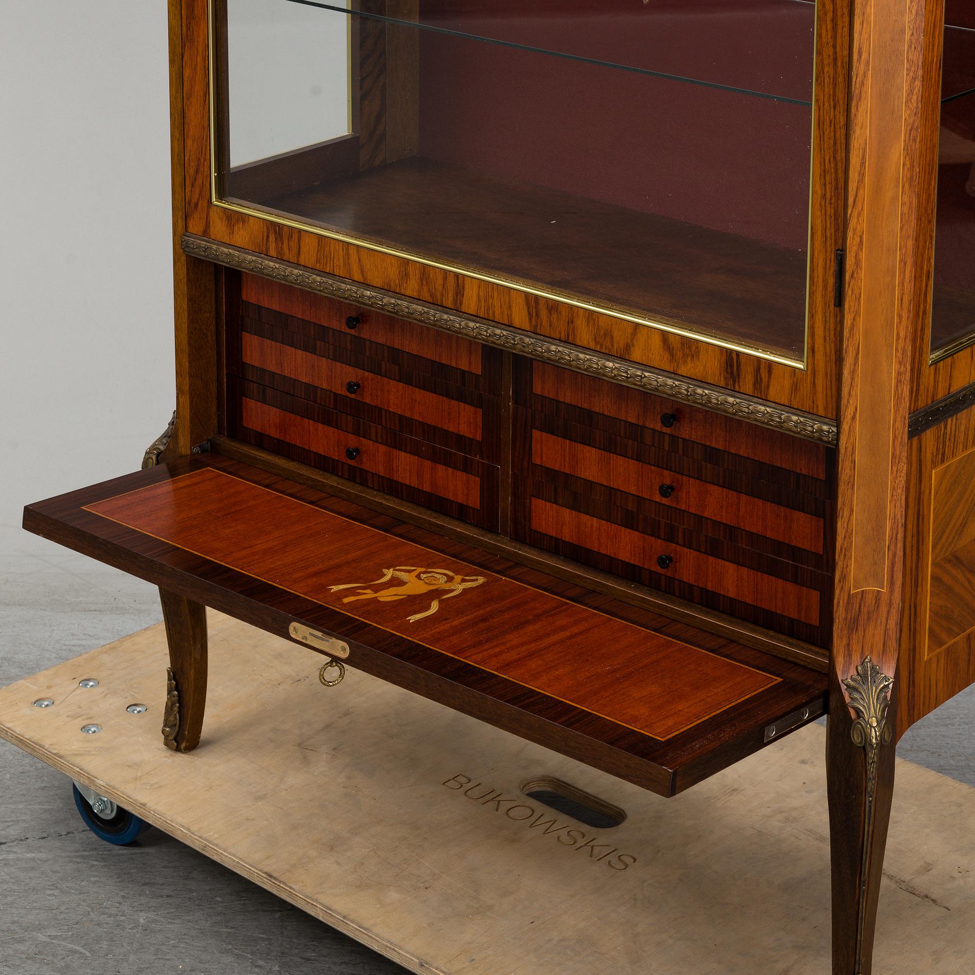 A Louis-XVI style display cabinet, third quarter of 20th century.