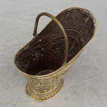 A 19th century brass coal basket.