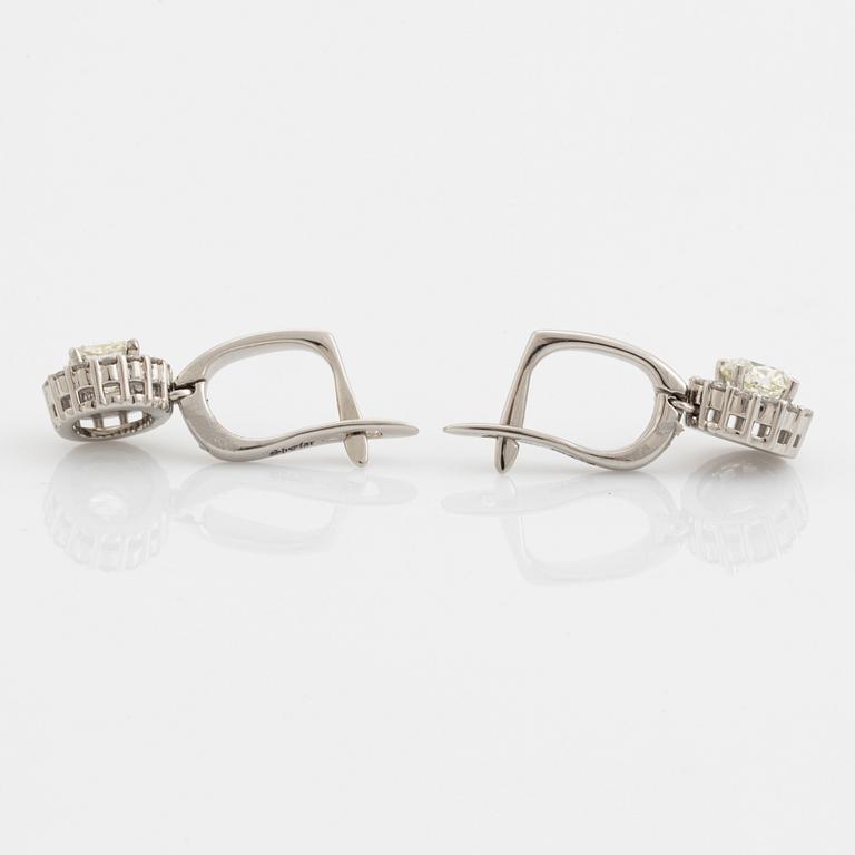 Cushion cut diamond earrings.