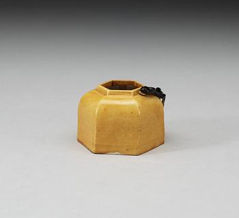 A yellow and brown glazed brush washer with curling dragon, Qing dynasty, 19th Century, with Xuande four character mark.