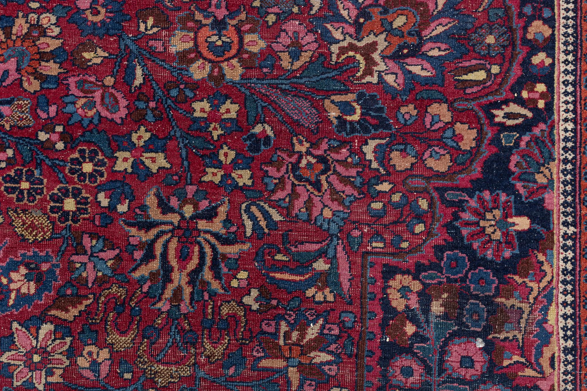A Meshed carpet, c. 405 x 320 cm.