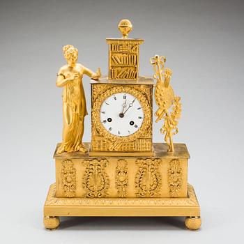 A French Empire early 19th century gilt bronze mantel clock.