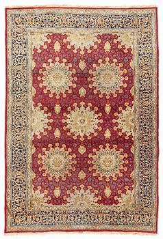 An oriental carpet, c. 290 x 198 cm.