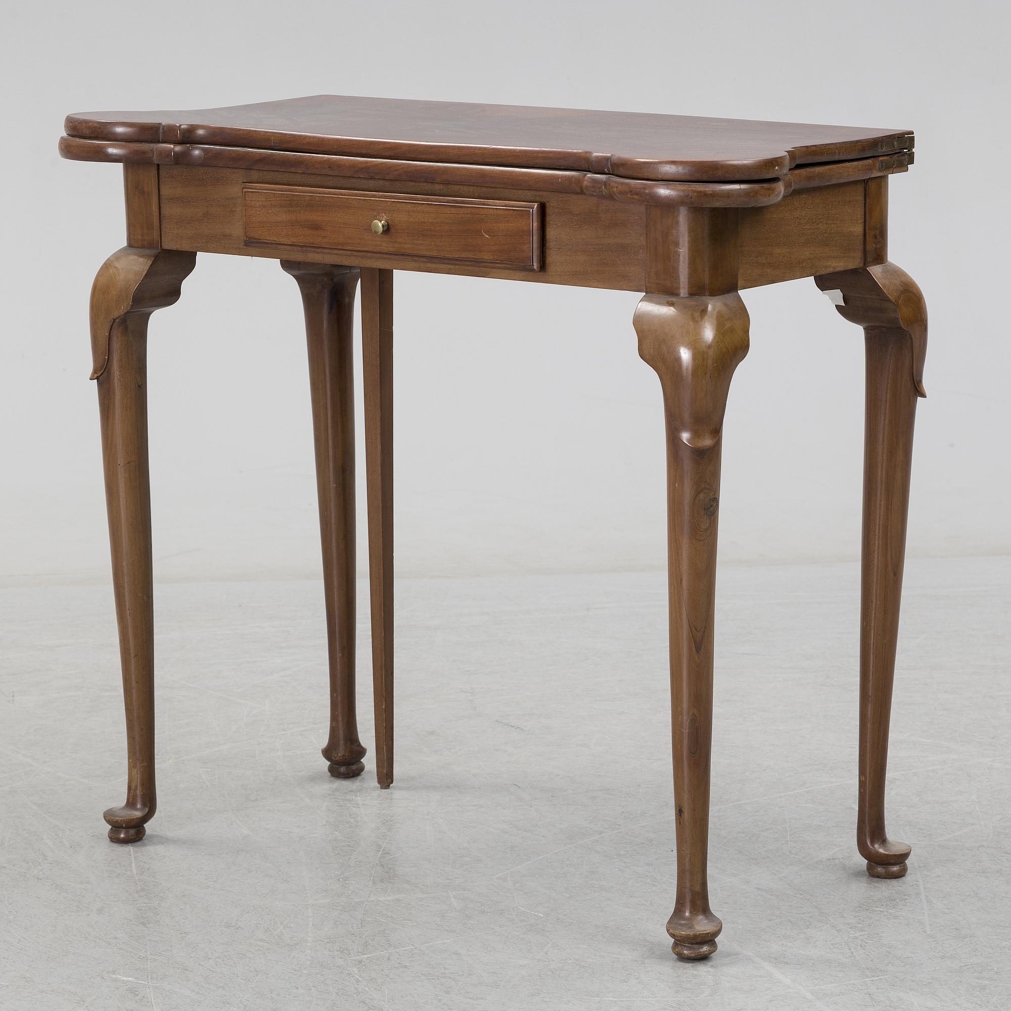 A mahogany games table, 18th Century.