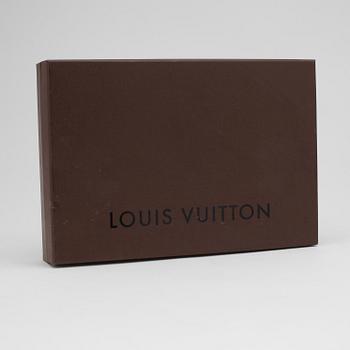 LOUIS VUITTON, a Monogram Denim "Mini Pleaty" handbag.