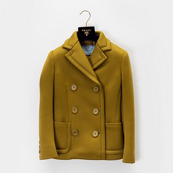 Prada, an olive green scuba jacket.