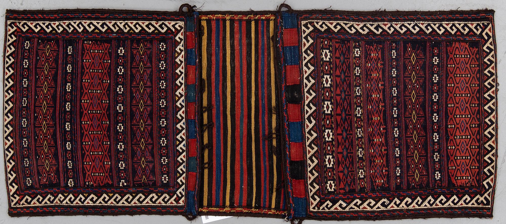 A baluch saddelbag, circa 154 x 63 cm.