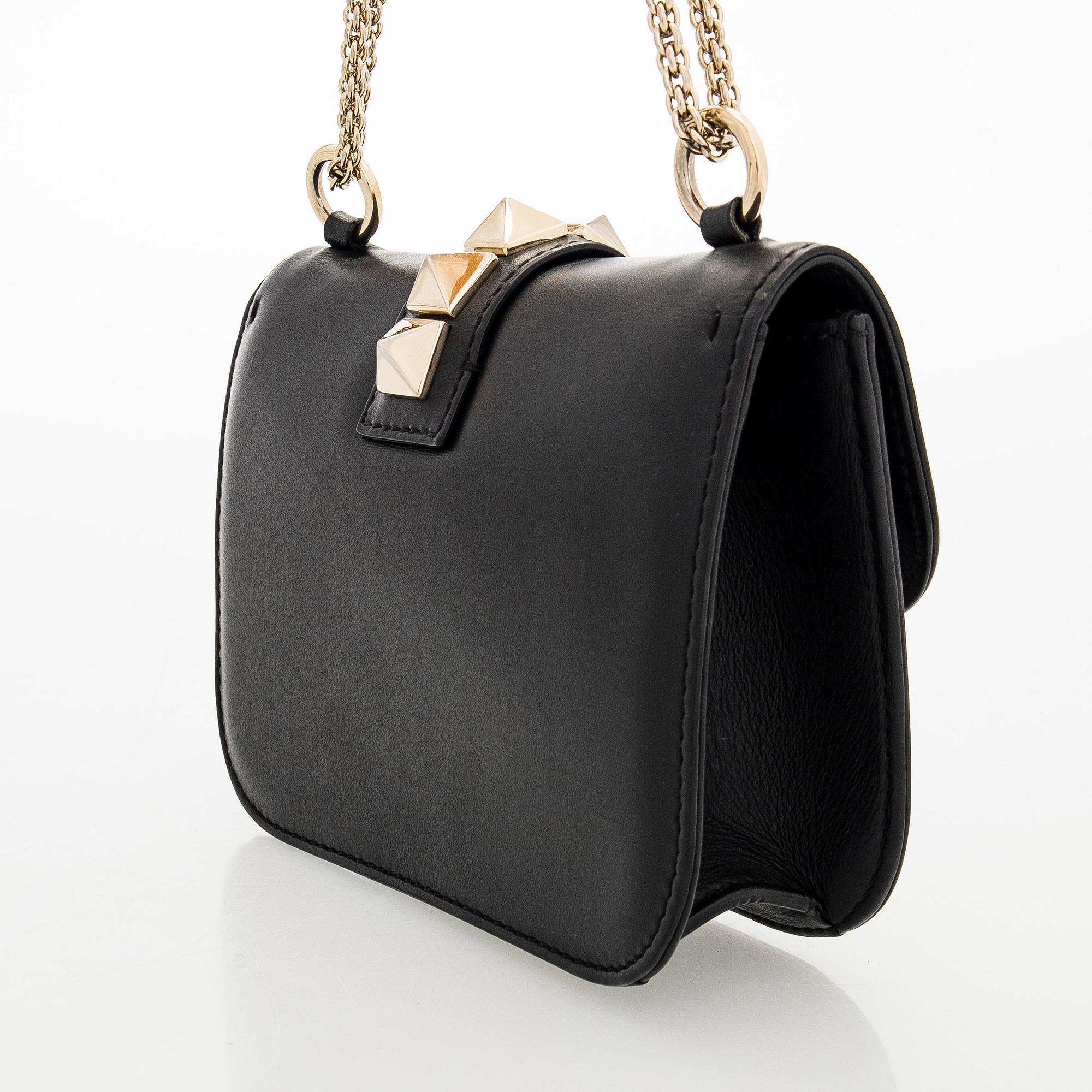 Valentino Garavani, a 'Glam Lock' bag.