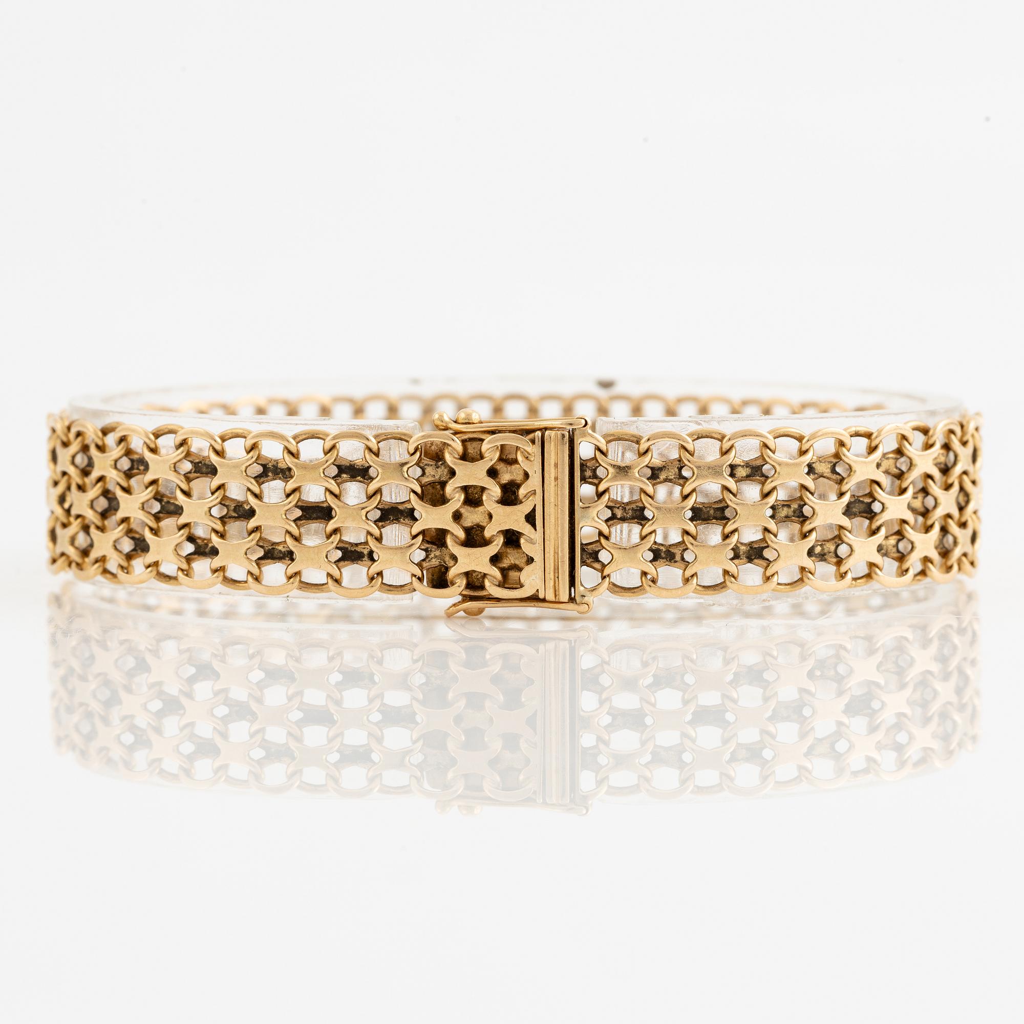 Arm bracelet, 18K gold, x-link.