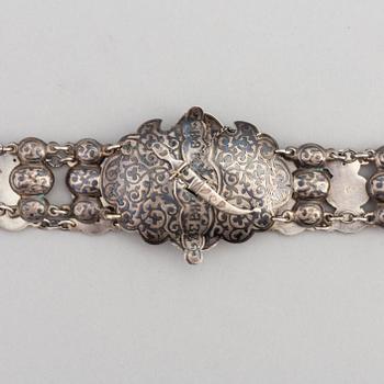 A Russian silver niello belt, circa 1900. Swedish import mark.