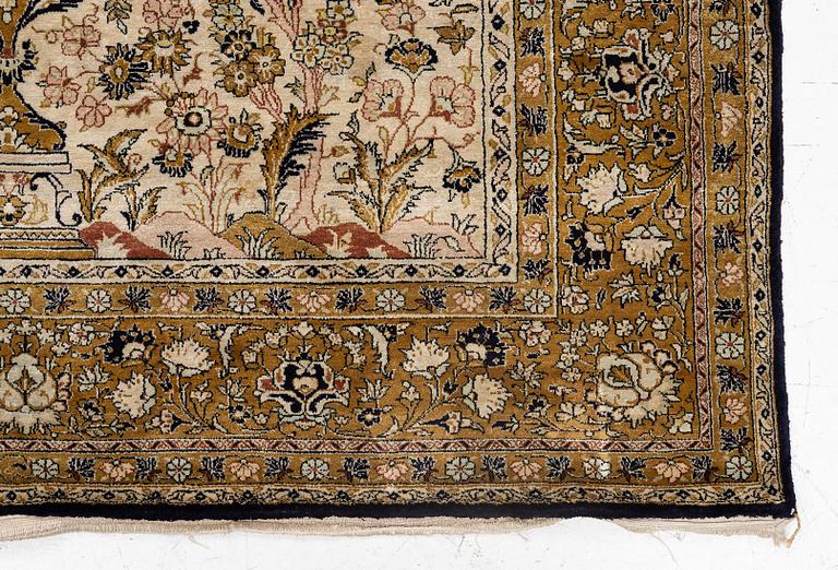 A Ghom, silk rug, c. 215 x 140 cm.
