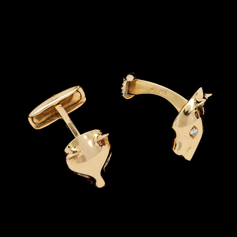 CUFFLINKS, shape of panthers head, gold with brilliant cut diamonds, tot. app. 0.12 ct. Weight 13 g.