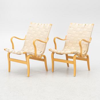Bruno Mathsson, a pair of 'Eva' armchairs, DUX, Sweden, second half of the 20th century.