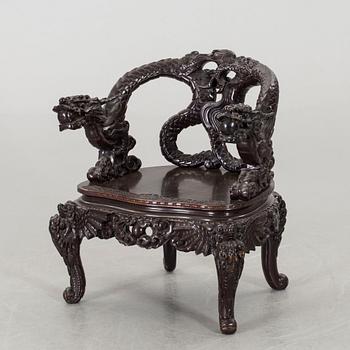 A Chinese 20th century wooden armchair.