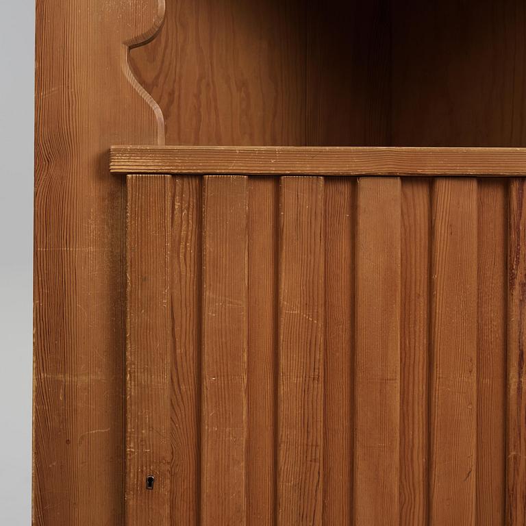 Axel Einar Hjorth, a stained pine "Utö" corner cabinet, Nordiska Kompaniet, Sweden, 1930s.