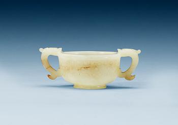 1723. A archaistic nephrite wine cup, Qing dynasty.