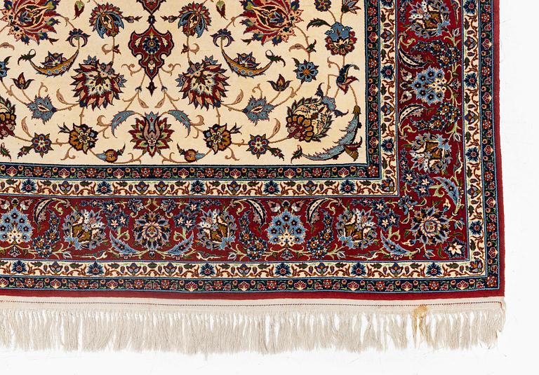A semi-antique Isfahan rug, c. 225 x 143 cm.