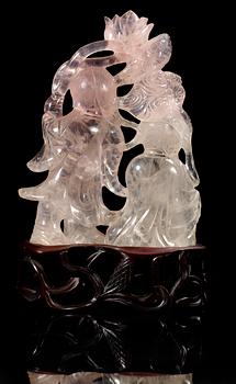A carved rose quartz figure group, China early 20th Century.