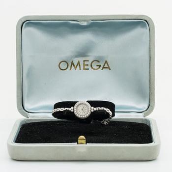OMEGA smyckeur, 15 mm, 18k vitguld m briljanter ca 0,40 ct totalt, armband G Dahlgren & Co, Malmö 1957, originaletui.